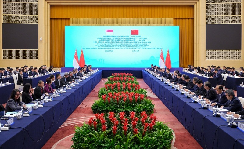 丁薛祥会见新加坡副总理颜金勇并共同主持中新双边合作机制会议
