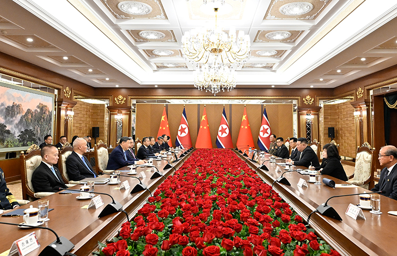 习近平同金正恩举行会谈