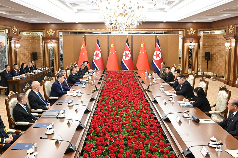 习近平同金正恩举行会谈